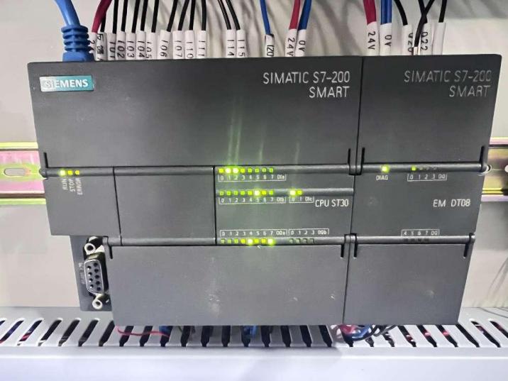Siemens SINAMICS servo drive and PLC inside electrical cabinet